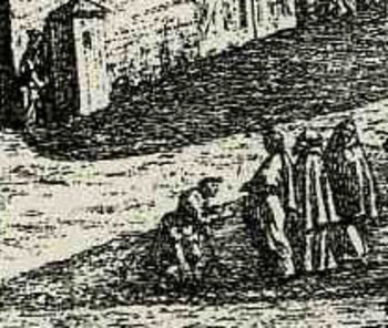Bloglooking_closely_b_kneeling_man
